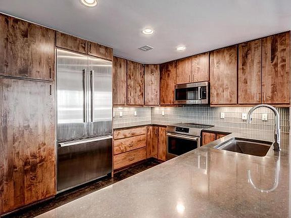 Fully-equipped kitchen with Bosch appliances. Dishes, pots and plans, linens, cleaning supplies, staples, spices supplied.