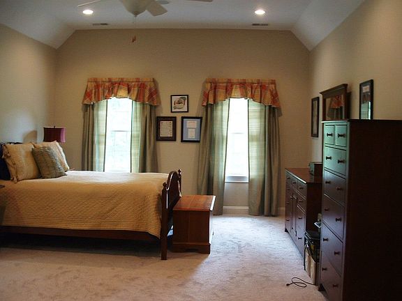 HUGE MASTER WITH SITTING AREA AND HIS AND HER WALK-IN CLOSETS                 