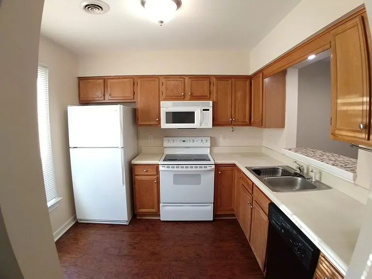 Kitchen - Dishwasher, Refrigerator, and Range have been replaced with new Stainless models