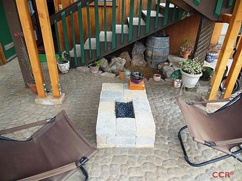 Outdoor gas fireplace feature.