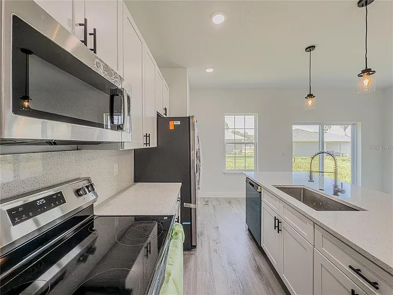 14245 SW 28th Ct — Photo 34