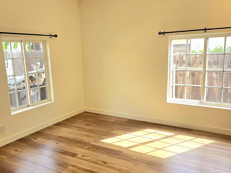 Bedroom 1 - new paint, new floors, new closet doors, new light fixture. 
ALL NEW AND CLEAN.