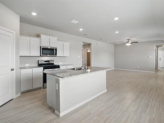 Kitchen-All Home and community information, including pricing, included features, terms, availability and amenities, are subject to change at any time without notice or obligation. All Drawings, pictures, photographs, video, square footages, floor plans, elevations, features, colors and sizes are approximate for illustration purposes only and will vary from the homes as built.