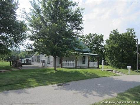 Your little peace of heaven on almost 7 acres.  Be totally self-sufficient.     There is public water and electricity, but there is a well, wood furnace and a generator which could sustain you if you went off the grid.