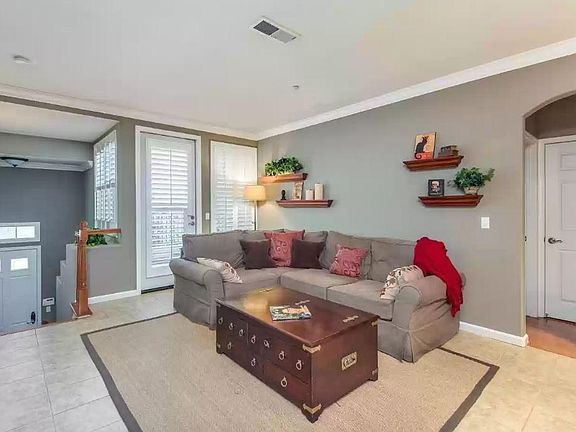 Living Room with Door to a large Balcony