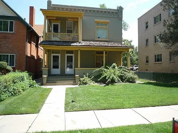 Unit #4 is through the left door and up the stairs on the left side of the building