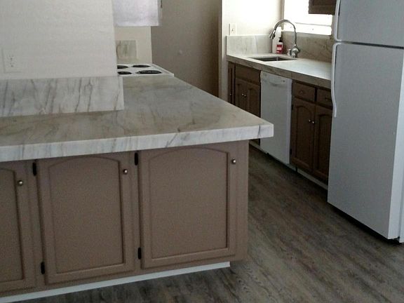 New Granite Counter-tops & Floor Covering
