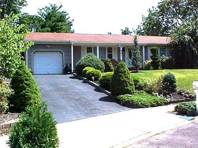 Professionally Landscaped Property on Private Cul de sac.