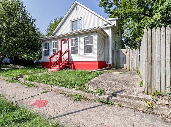 Pictured from the NE.  This home sits on a corner lot.