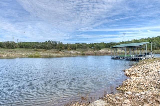 Your own private cove with a capsulated covered boat dock and swim deck on Lake Travis!