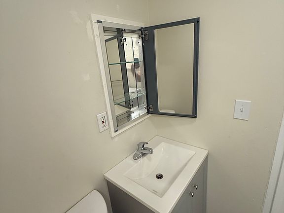 Three Mirrored Medicine Cabinet