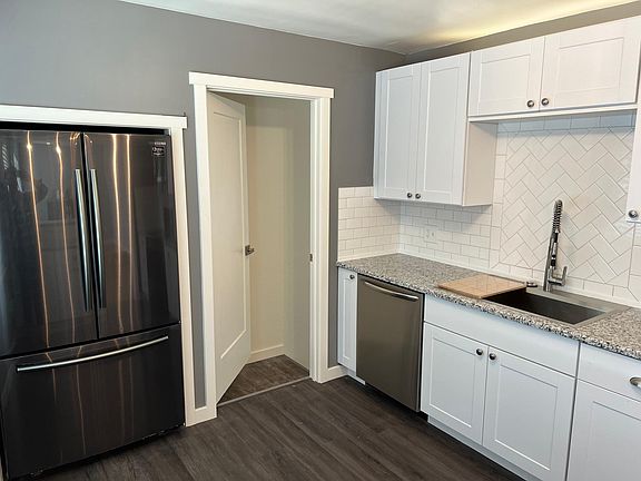 Kitchen with door to basement