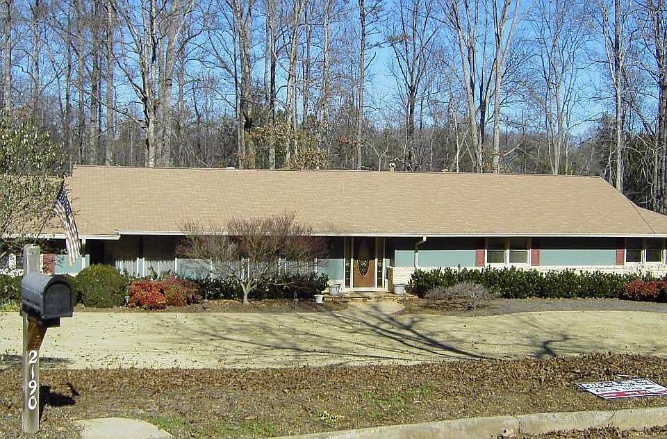 House sits on Level Gently Sloping Lot. This Home has a 6 Zone Sprinkler Syste