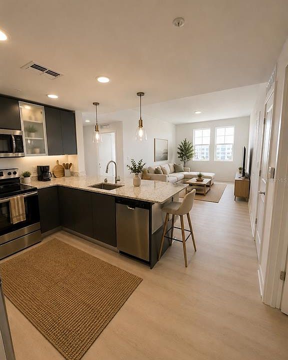 1st image of 5579 MILLENIA PARK BOULEVARD #309