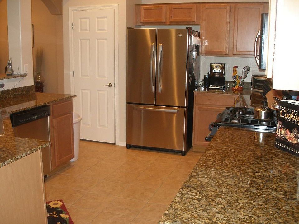 granite, stainless, large stool height island with sink,dishwasher; gas stove