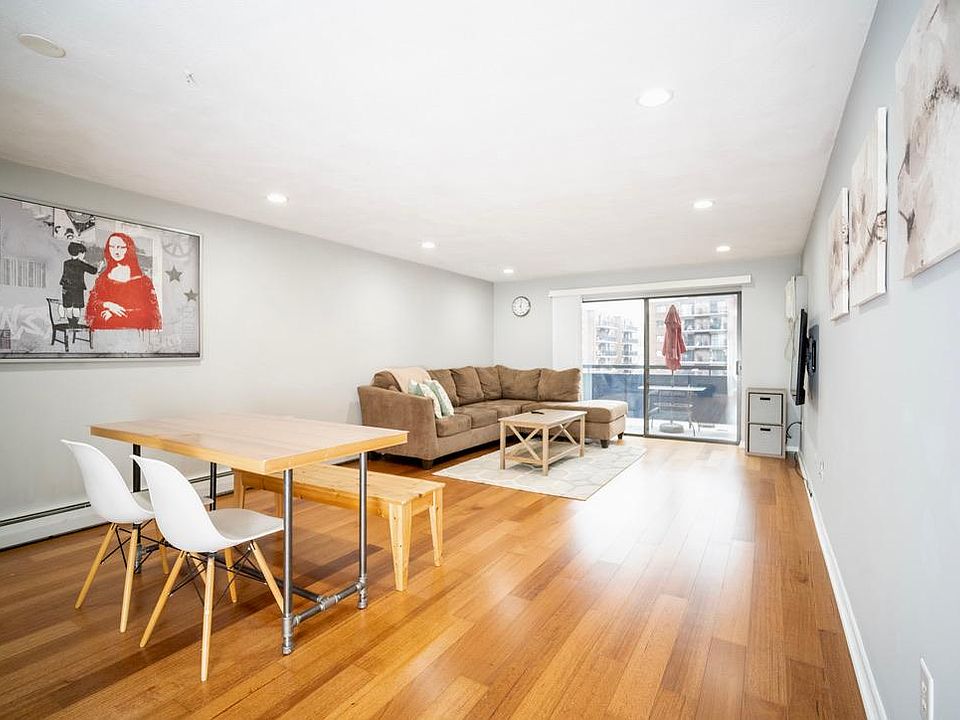 living room & dining area, with a sizable balcony
