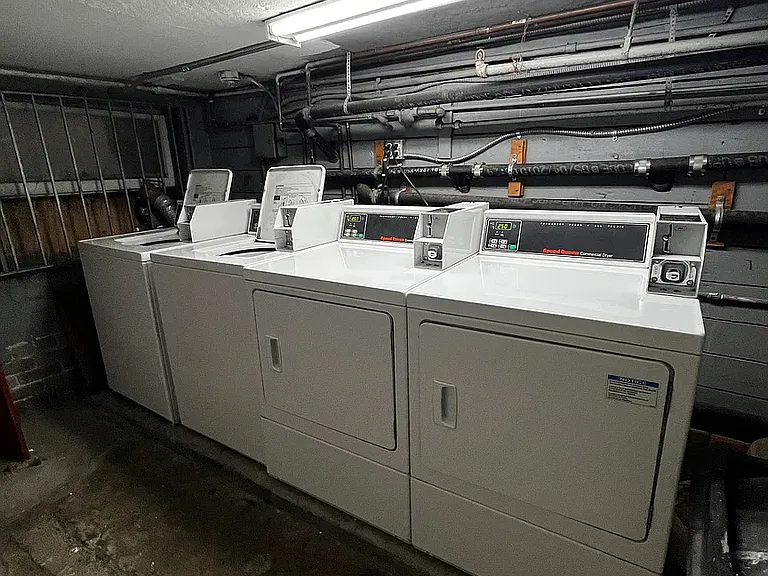 Shared coin laundry is on basement level.
