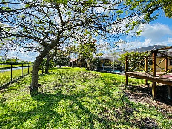 Huge back yard with deck.