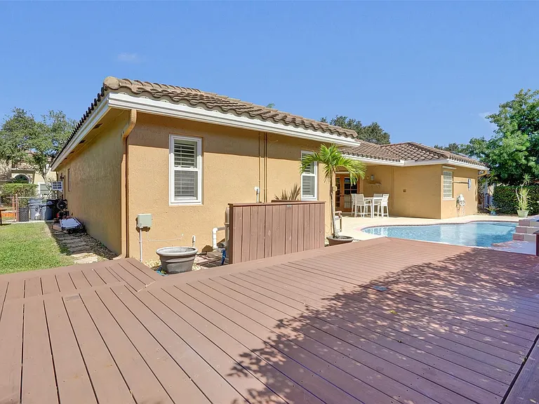 4142 NW 58th Dr — Photo 65