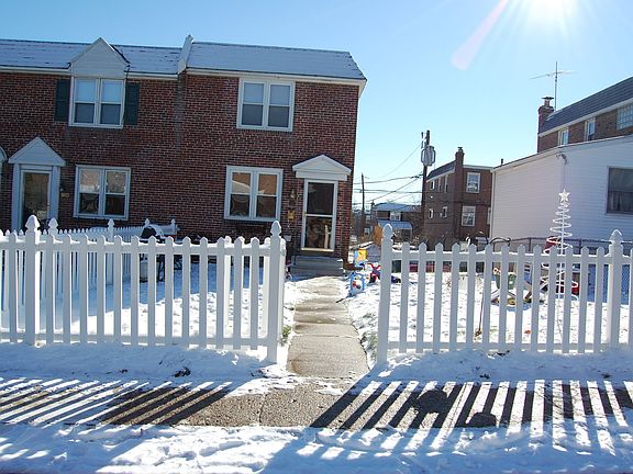 front of house with fence