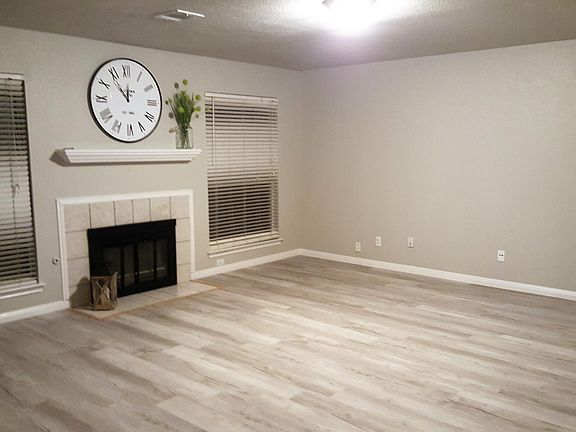 Large Great Room with gas fireplace.