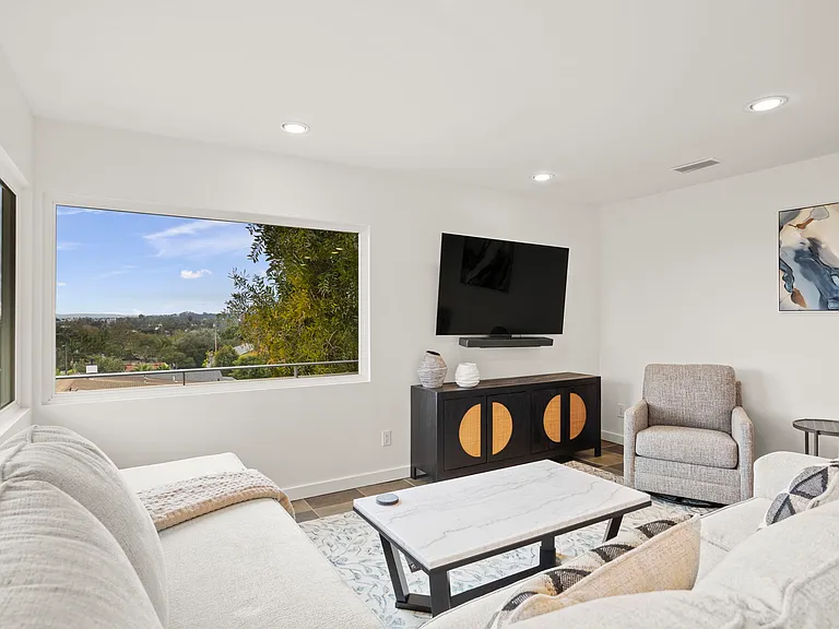 65" mounted television & soundbar.