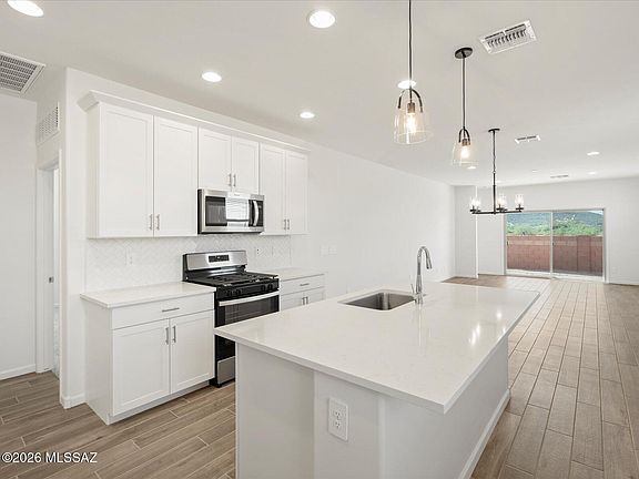 5th image of 9756 N Solstice Ave