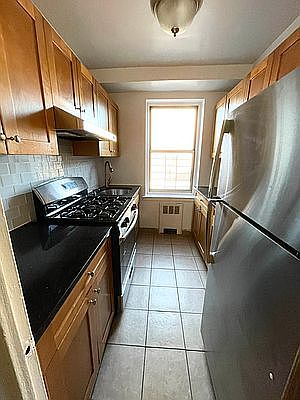 2nd image of 64-42 Booth St #2