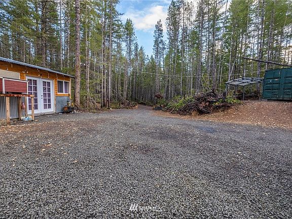 Another view of the storage building. You also have plenty room for your toys in the large storage container and the carport. 