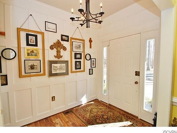 Step into your foyer that opens to brand new imported Acacia har