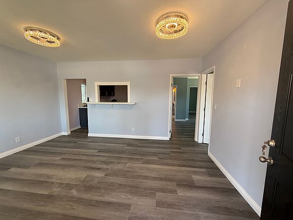 Living room with all new lighting fixtures with fans!