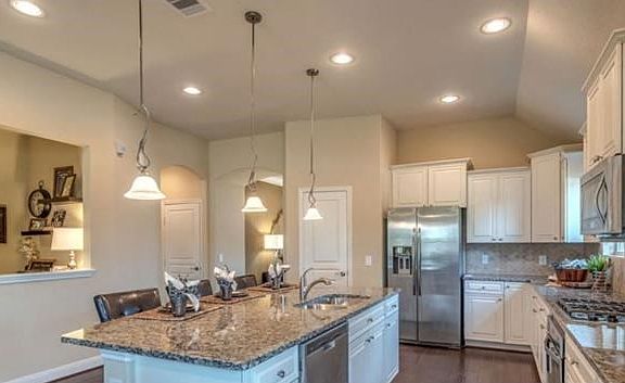 Photo of Pulte Homes Model Home with Same Floor Plan, Not of Actual Home Listed