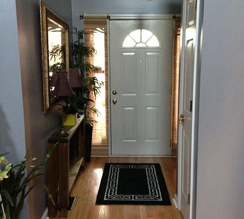 This foyer not only says "Hello" it says "WELCOME" and sets the stage for a wa