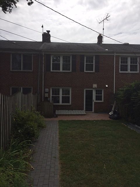 View of the rear of the house, nice brick patio, fully fence