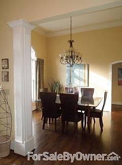 Striking Dining Room w/Butlers Pantry
						:
						12ft ceiling, beautiful arched window, exceptional columns, extra trim, hardwood