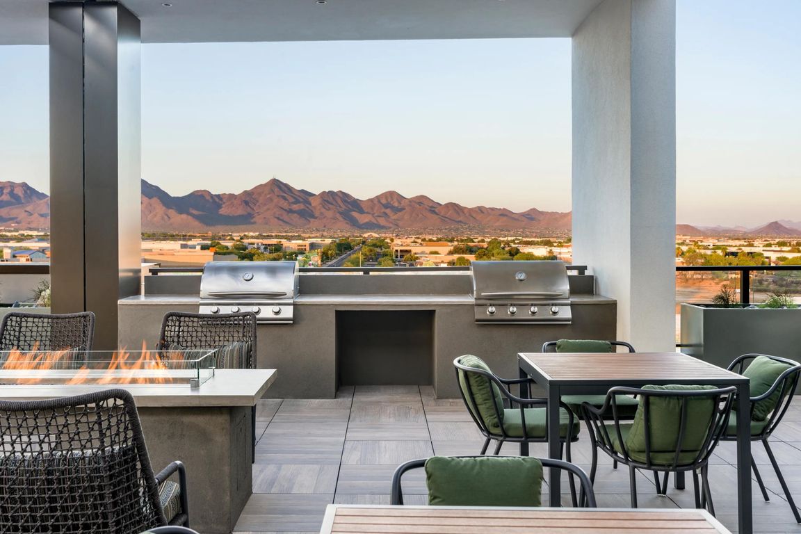 Grill, gather, and unwind with sweeping mountain views as your backdrop_this rooftop oasis is perfect for golden hour cookouts and cozy firepit conversations.