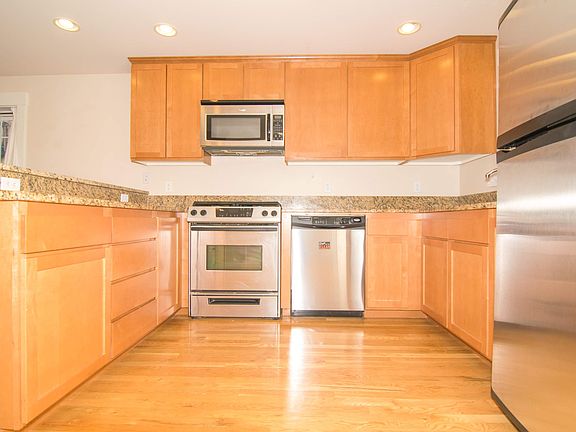 Main Floor Gourmet Kitchen with Stainless Steel Appliances