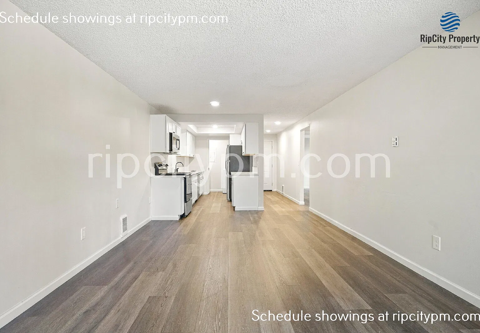 Fully Remodeled 3-Bedroom Duplex with Primary Suite, Huge Fenced Yard & Garage — Photo 2