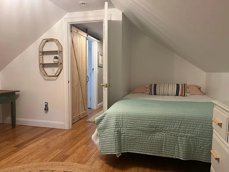 Upstairs bedroom with full size bed and 2 twins