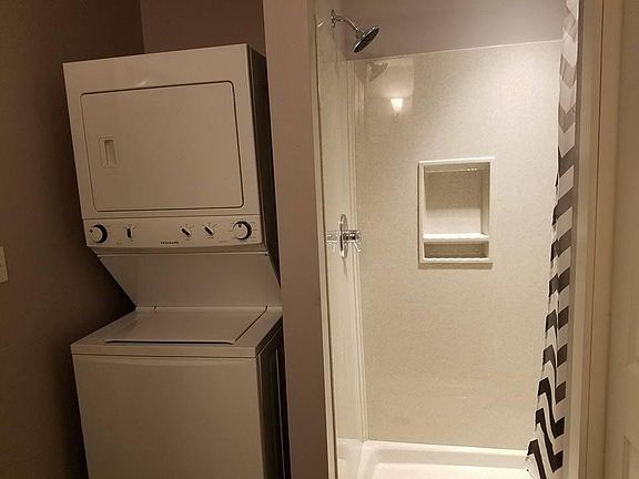 Stackable washer/dryer in unit