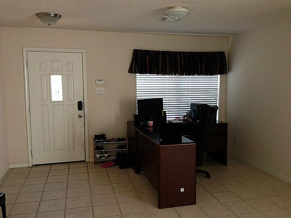 Living area can also be used as a study.