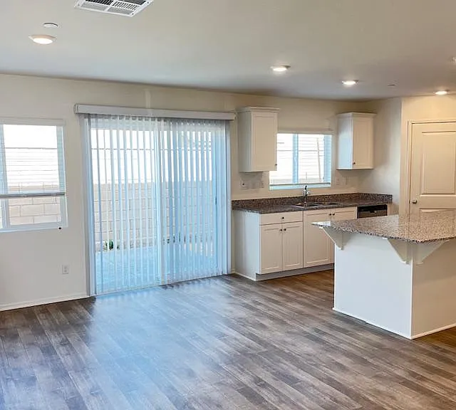 Kitchen & Living Room.