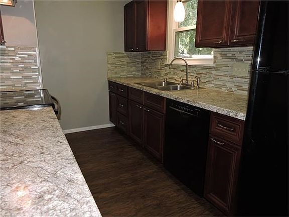 Galley kitchen has recently been completely remodeled