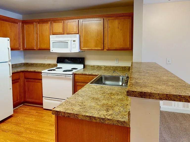 Village Green Apartment Homes — Photo 14