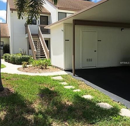 Carport and attached shed