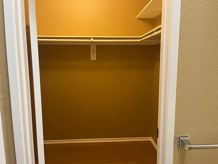 MASTER BEDROOM WALK IN CLOSET