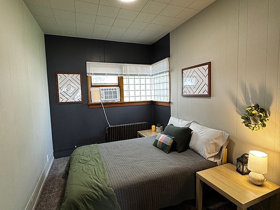 AC ready to go by the bed. All newly updated with new blinds.