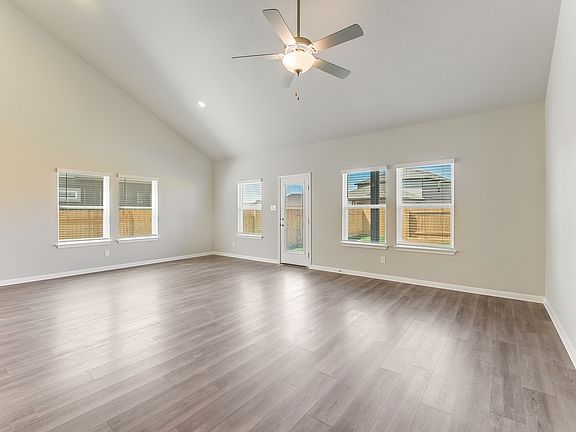 The living room provides plenty of room for hosting guests.