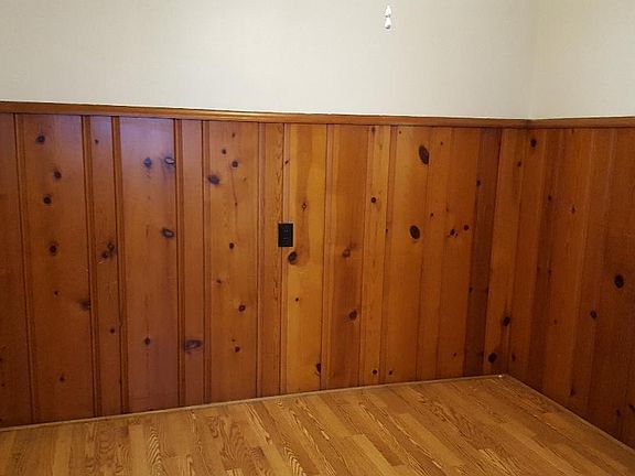 Dining nook with ceiling fan.