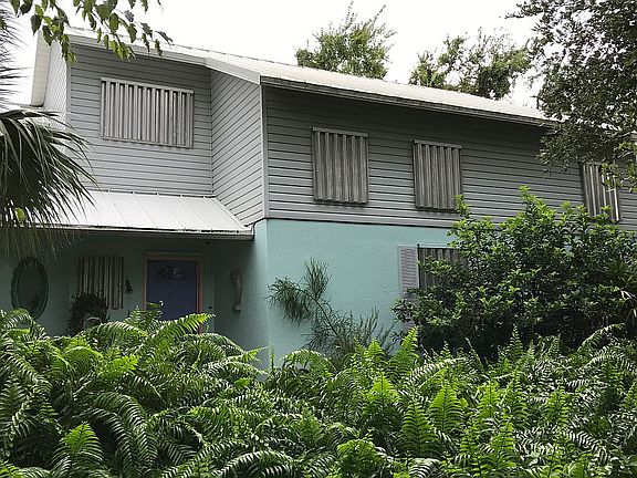 Hurricane shutters, west sid
